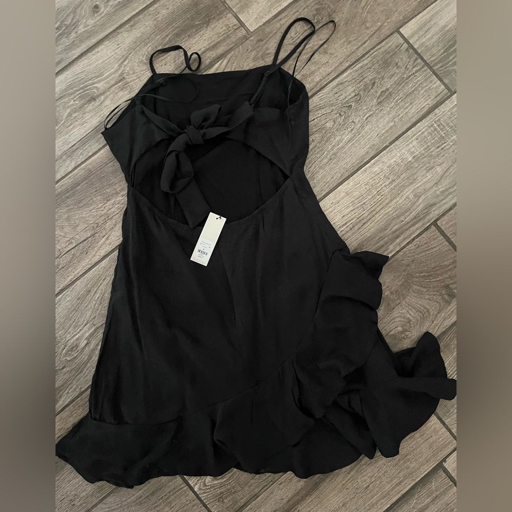 Francesca’s black tie back dress